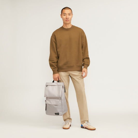 The ReNew Transit Backpack | Warm Quartz (with label)
